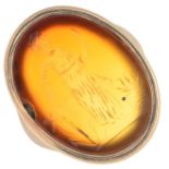 A carnelian intaglio ring.