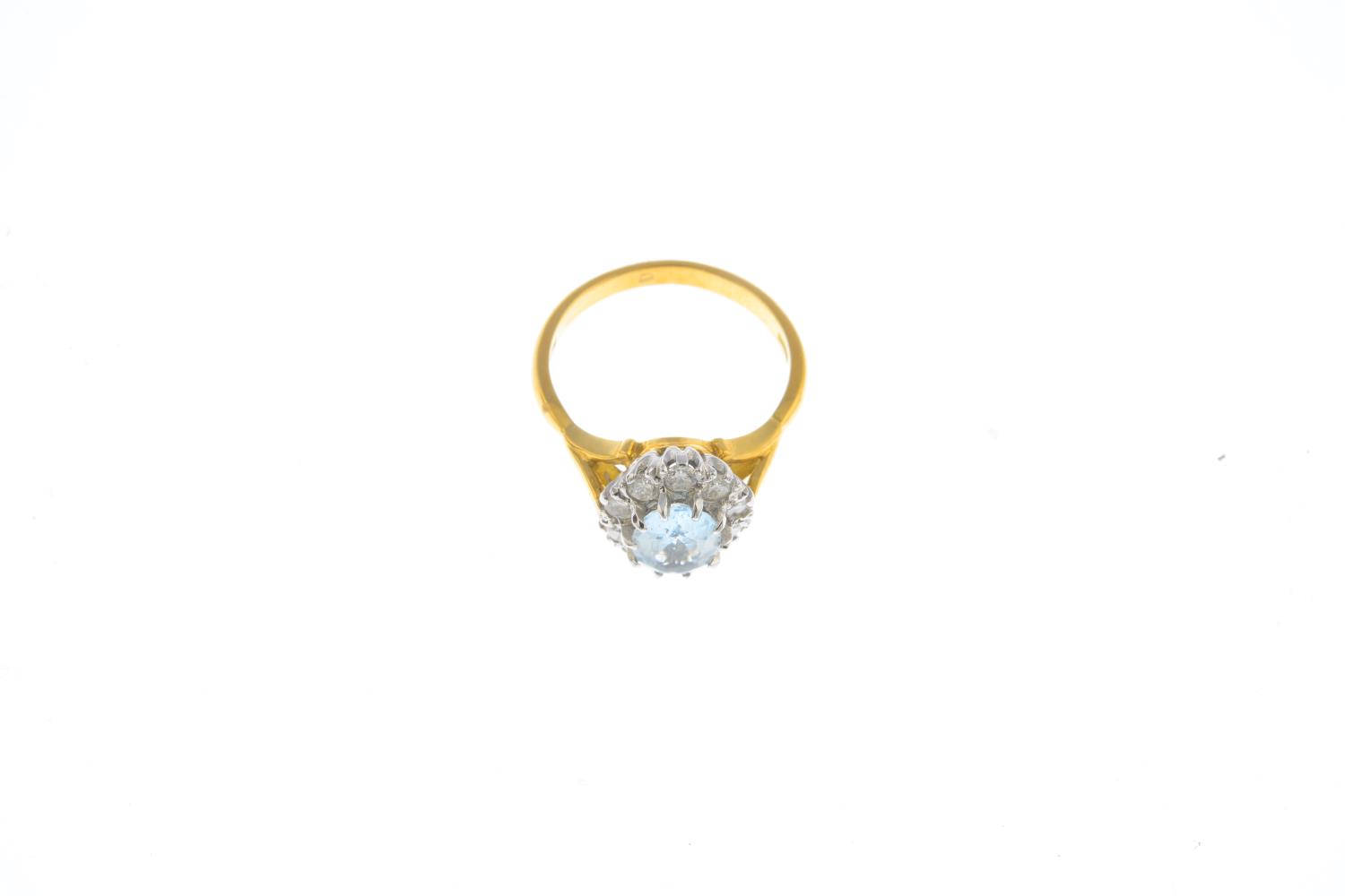 An 18ct gold aquamarine and diamond cluster ring. - Image 3 of 4