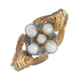 A mid Victorian gold split pearl and green gem ring.