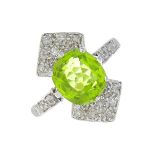 A peridot and diamond ring.