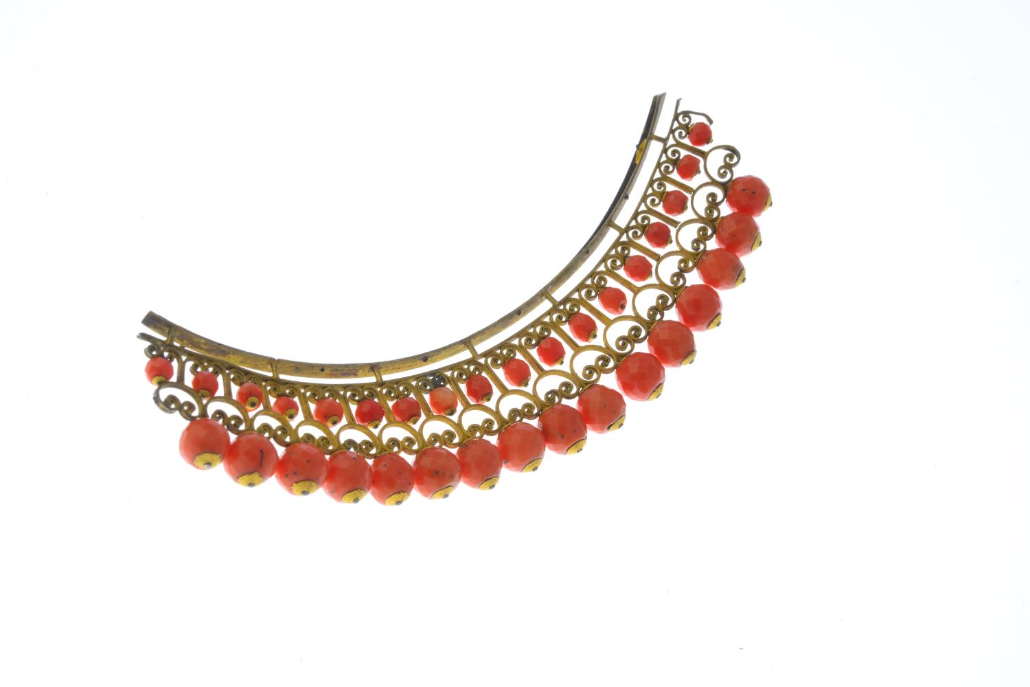 A late Georgian 15ct gold coral hair comb. Of openwork design, with faceted coral bead highlights. - Image 2 of 2