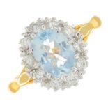 An 18ct gold aquamarine and diamond cluster ring.