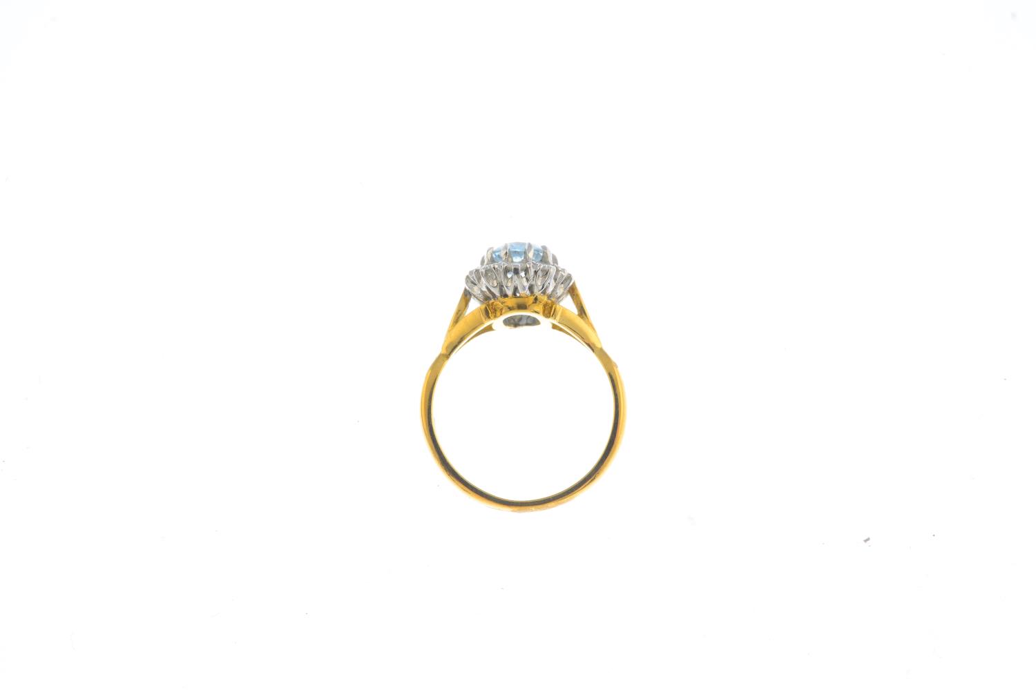 An 18ct gold aquamarine and diamond cluster ring. - Image 2 of 4