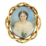 A mid Victorian gold portrait miniature brooch.