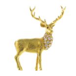 An 18ct gold diamond stag brooch.