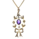 An early 20th century amethyst and split pearl pendant.