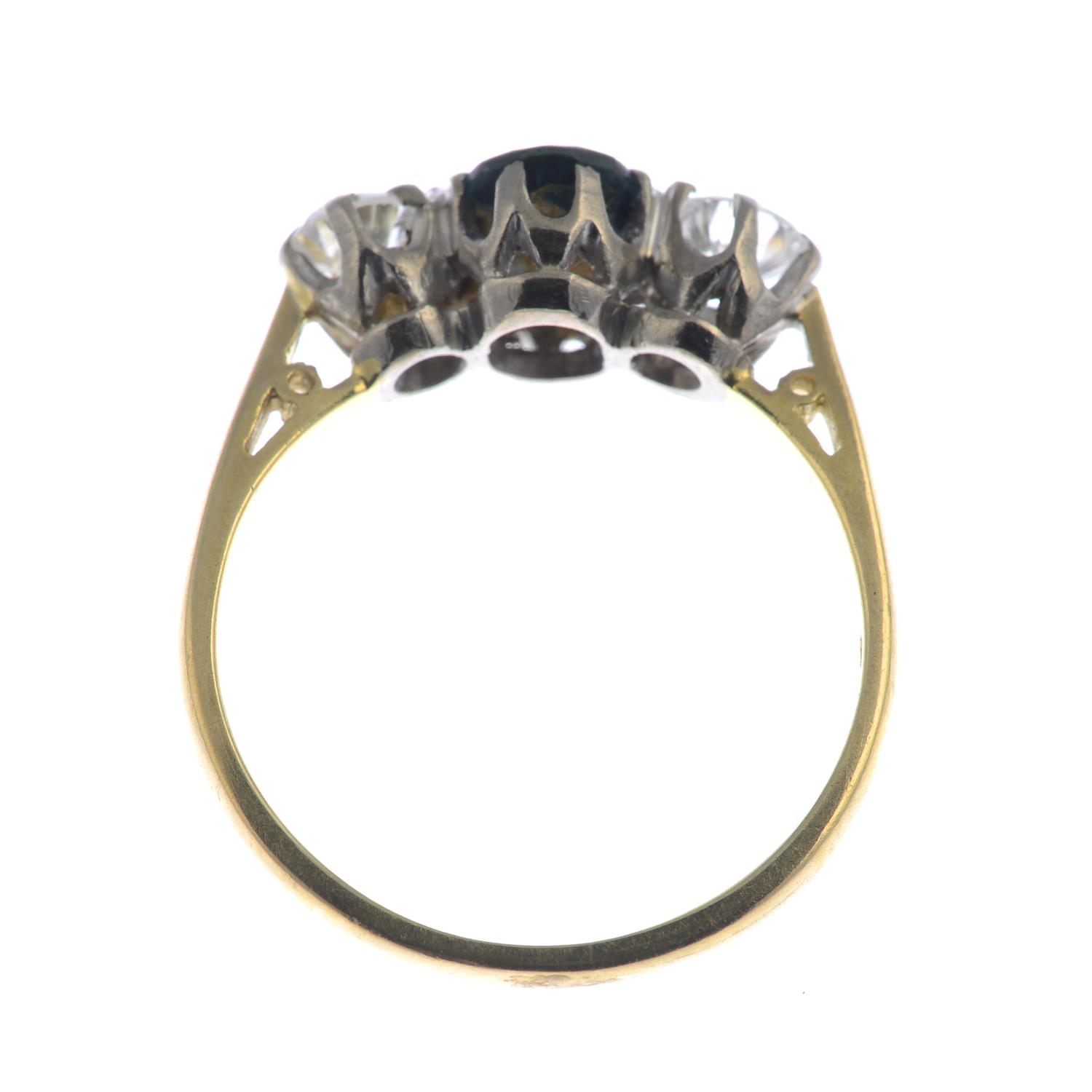 An 18ct gold diamond and sapphire three-stone ring. - Image 2 of 3