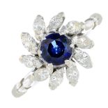 A sapphire and diamond cluster ring.