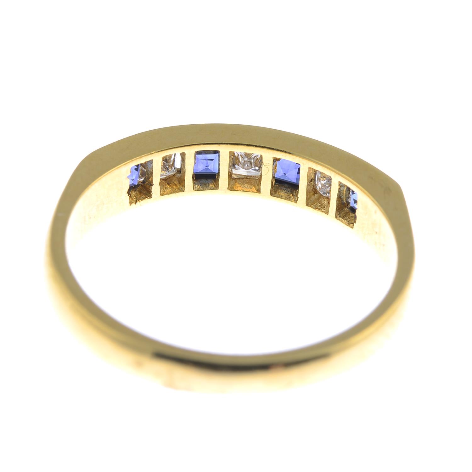 An 18ct gold sapphire and diamond half eternity ring. - Image 3 of 3