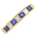 An 18ct gold sapphire and diamond half eternity ring.