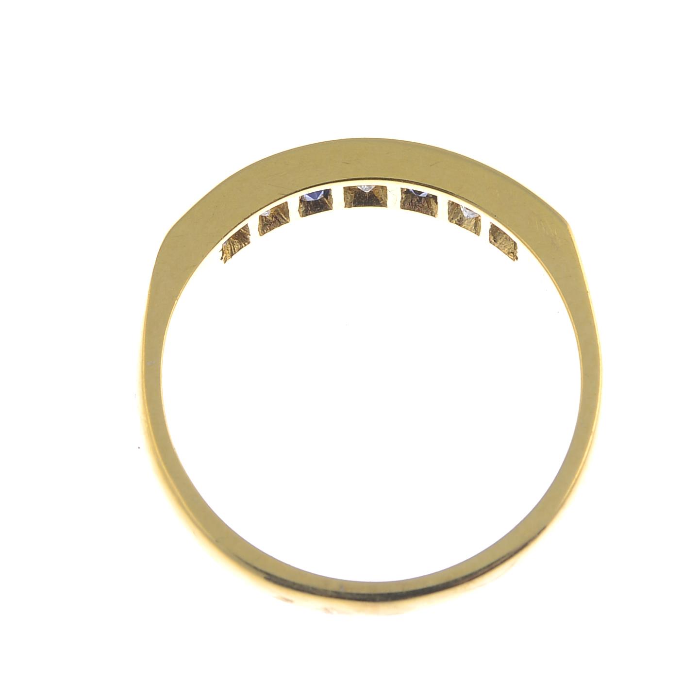 An 18ct gold sapphire and diamond half eternity ring. - Image 2 of 3