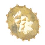 A citrine single-stone ring.