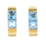 A pair of 18ct gold topaz earrings.