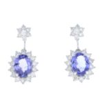 A pair of tanzanite and diamond earrings.