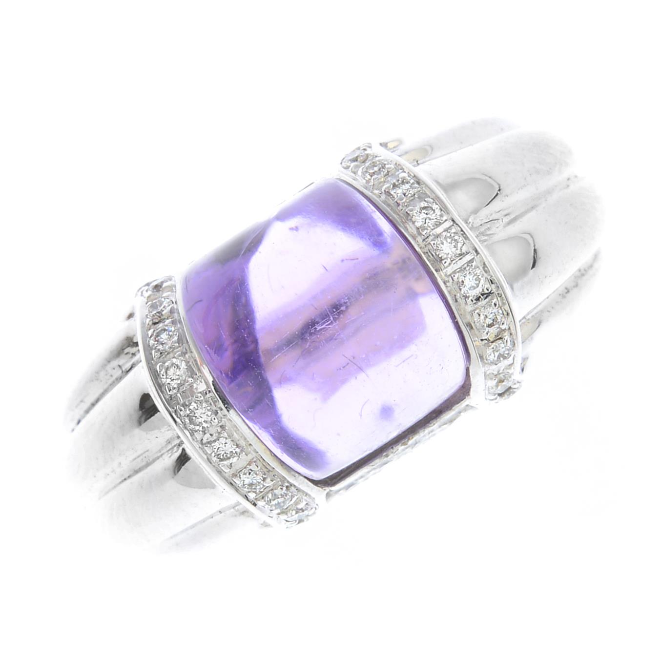 An 18ct gold amethyst and diamond ring.