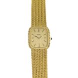 EBEL - a lady's 18ct gold wrist watch.