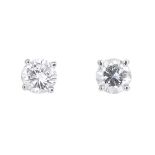 A pair of 9ct gold brilliant-cut diamond stud earrings.