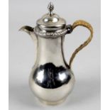 An early George III silver chocolate or hot water pot,