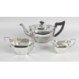 A George V silver three piece tea service,