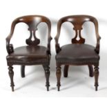 A set of five Victorian mahogany framed open back arm chairs,