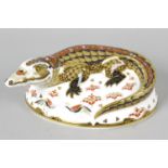 A Royal Crown Derby paperweight,