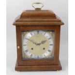 A Comitti of London mahogany cased bracket style mantel clock,