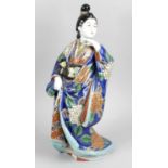 An early 20th century Japanese pottery figure,