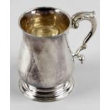 A George II plain silver pint mug,