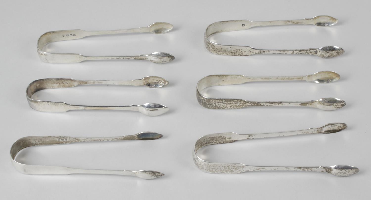 A selection of six pairs of silver sugar tongs,
