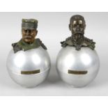 A pair of unusual early 20th century globular shaped metal containers,