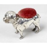 A silver pin cushion modelled as a pug dog,