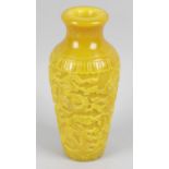 A Chinese yellow peacock glass vase,