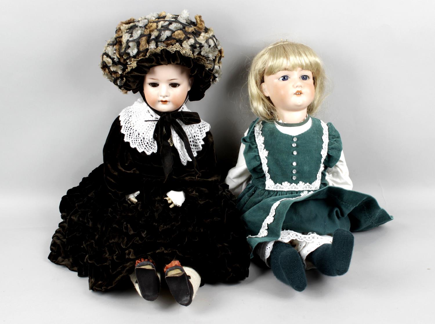 A selection of assorted bisque headed dolls,