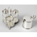 A mid-Victorian silver mounted and glass small cruet set,