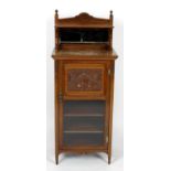 An Edwardian mahogany side cabinet,