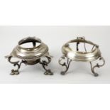 An Edwardian silver spirit kettle stand with beaded rim detail and raised on three scrolled