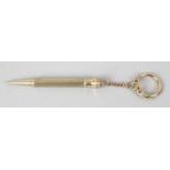 A 9ct gold cased miniature propelling pencil,