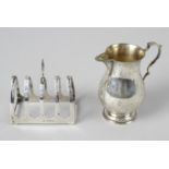 A 1930's small silver toast rack,