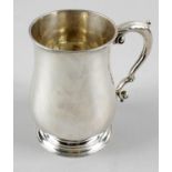 A George II plain silver pint mug,