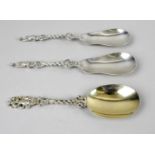 A pair of late Victorian silver apostle top serving spoons,