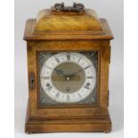 A mid 20th century Garrard and Co walnut cased bracket style mantel clock,