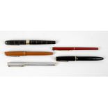 A group of six assorted fountain pens,