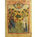 A 20th century religious icon painted on wooden panel with gold leaf highlights,