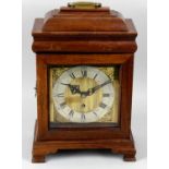 A mahogany cased bracket style mantel clock,