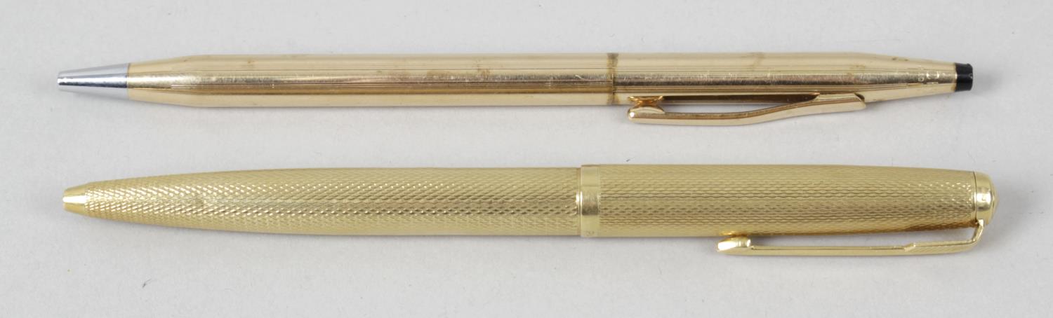 A Parker rollerball pen in 18ct gold engine turned decorated case, with engraved name panel F.
