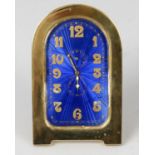 A Longines gilt metal and enamel easel style clock of arch shaped form,