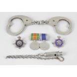 A George VI Police long service and good conduct medal, engraved to rim Inspr.