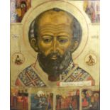 A 19th century religious icon painted on wooden panel with gold leaf highlights,