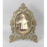 A Victorian brass easel style photograph frame,