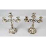 A pair of continental silver twin branch candelabra,